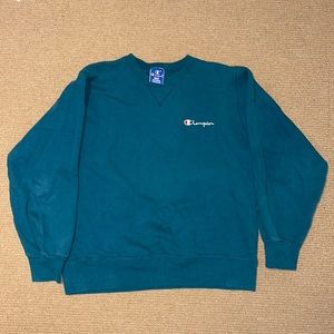 Champion crewneck teal size large but fits like a medium
